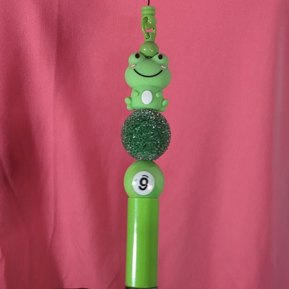 Green frog pen. Homemade and with a clip so you don't lose it.